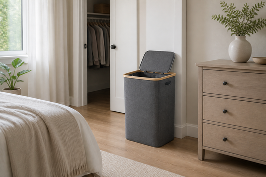 Laundry hamper placed beside a bedroom dresser with clear space around it