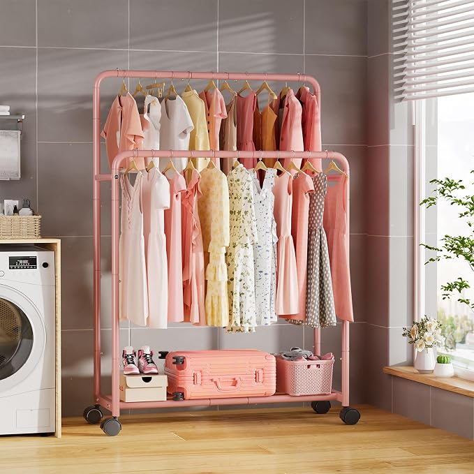 Simple Trending Clothing Clothes Rack, Double Rod Garment Rack, Pink | Portable Closet with Bottom Shelf, Anti-Slip Stoppers, 360° Lockable Wheels, Multiple Uses, Bedroom, Laundry Room