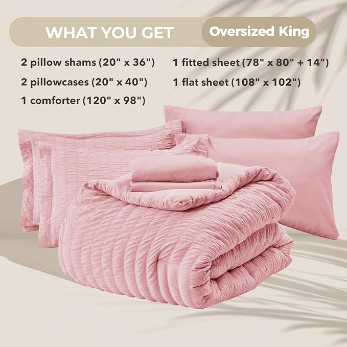 HYMOKEGE Pink Oversized King Comforter Set Seersucker 7 Pieces, All Season Luxury Bed in a Bag for Bedroom, Bedding Set with Comforter, Sheets, Pillowcases & Shams