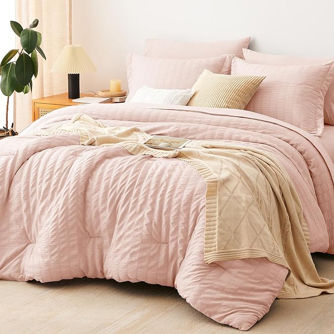 Oversized King Seersucker Comforter Set, Blush Pink, 120 x 98 in | OEKO-TEX Certified, 7 Pieces Bed in a Bag with 240 GSM Down Alternative Comforter, Flat & Fitted Sheets, Pillowcases & Shams